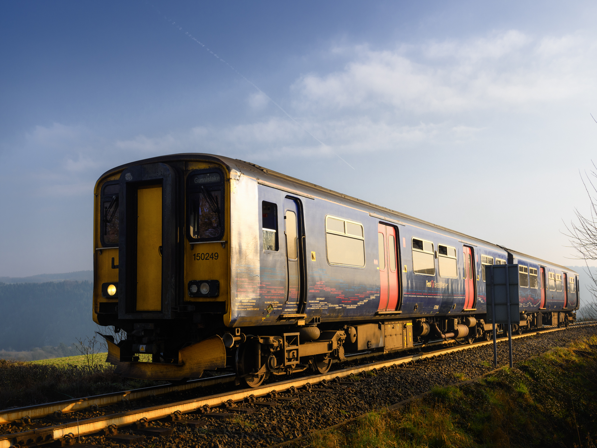 A photograph of a First Great Western class 150 train on its way to Gunnislake from Plymouth at Sundays Crossing